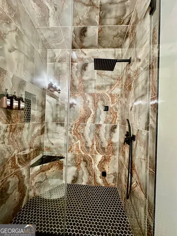 a living room with furniture and a couch