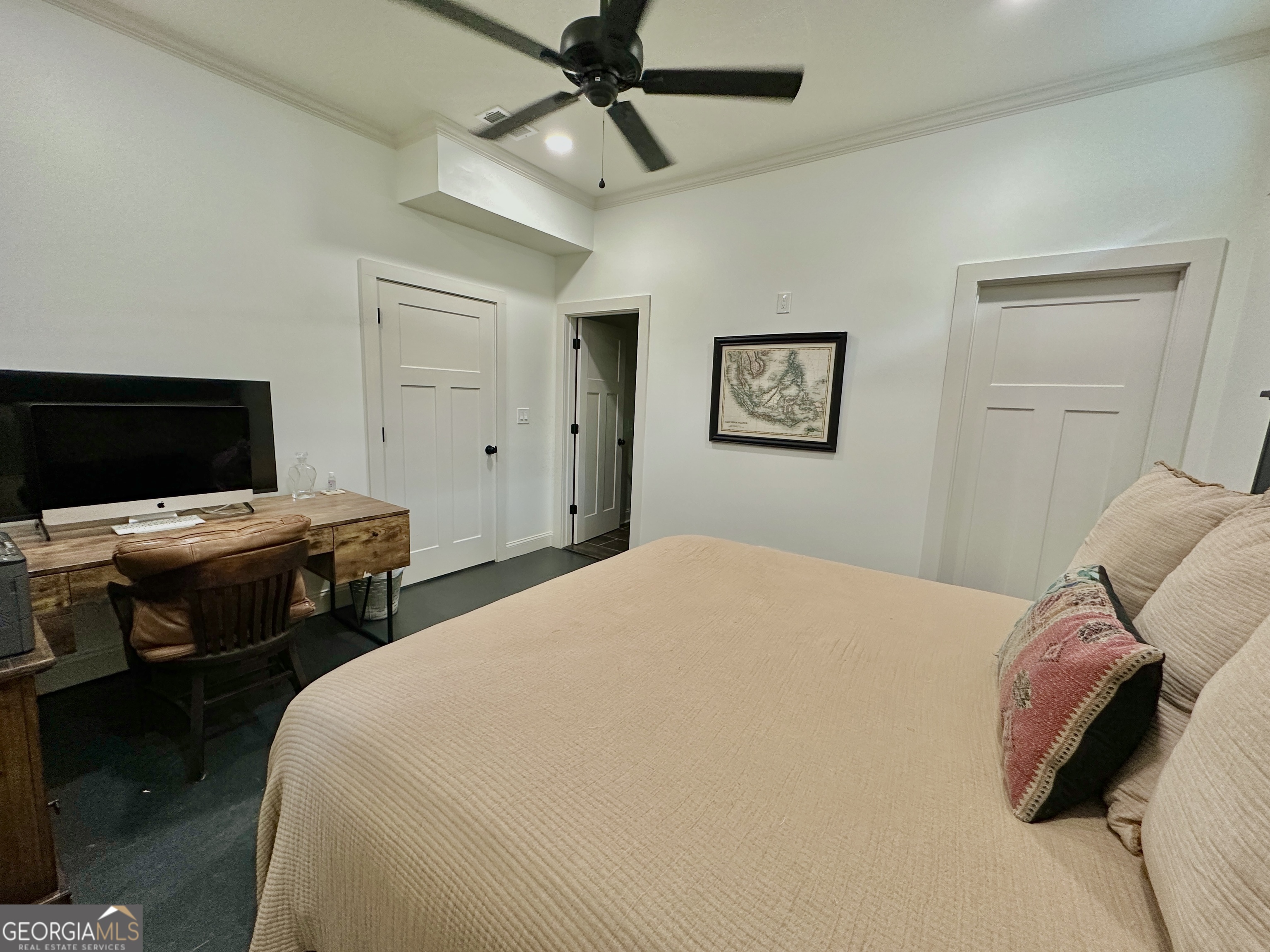 775 Ridgewood Avenue Gainesville, GA 30501 - Photo 34 of 77 a bedroom with a bed and a desk