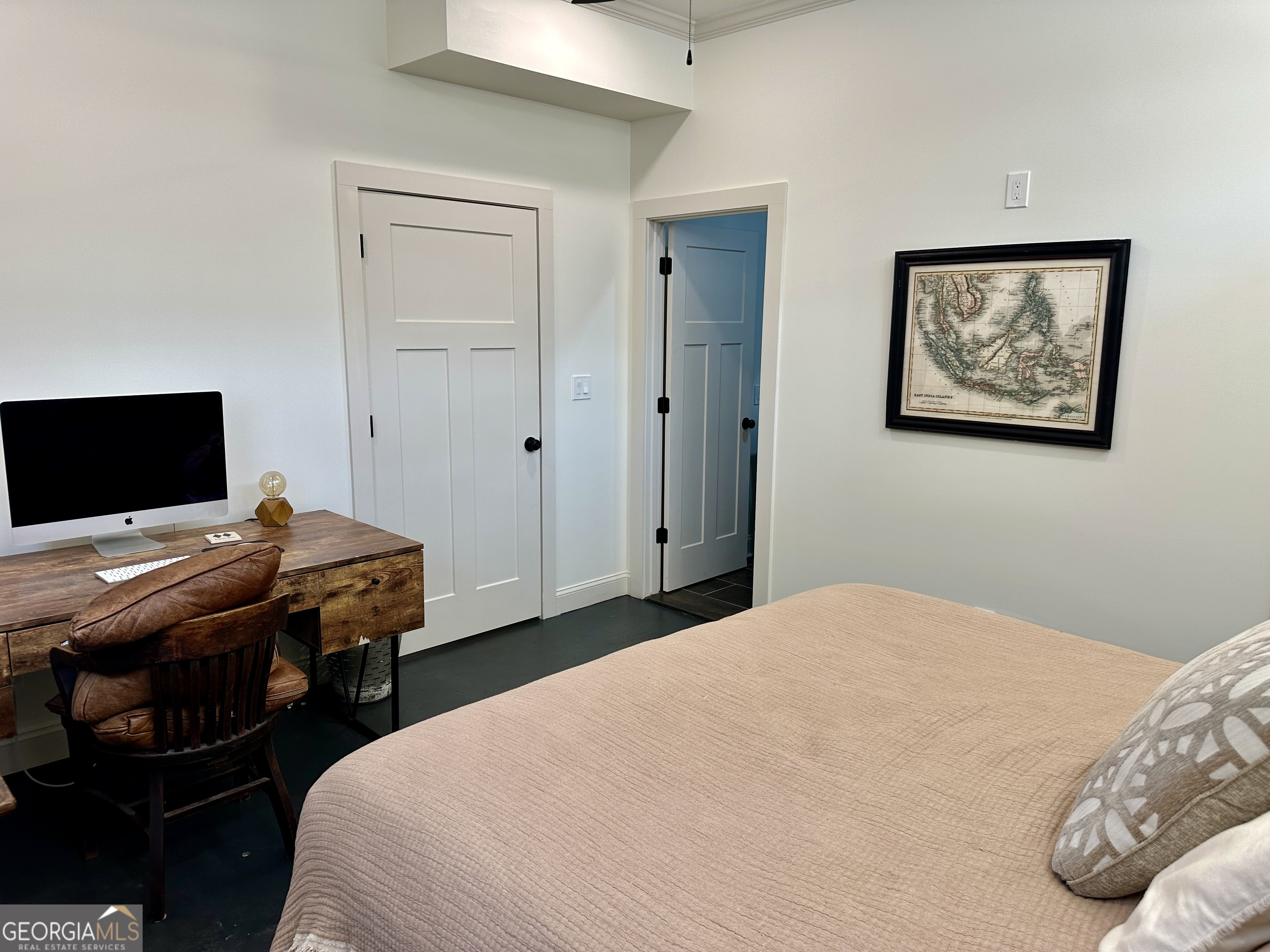 775 Ridgewood Avenue Gainesville, GA 30501 - Photo 36 of 77 a bedroom with a bed and a flat screen tv