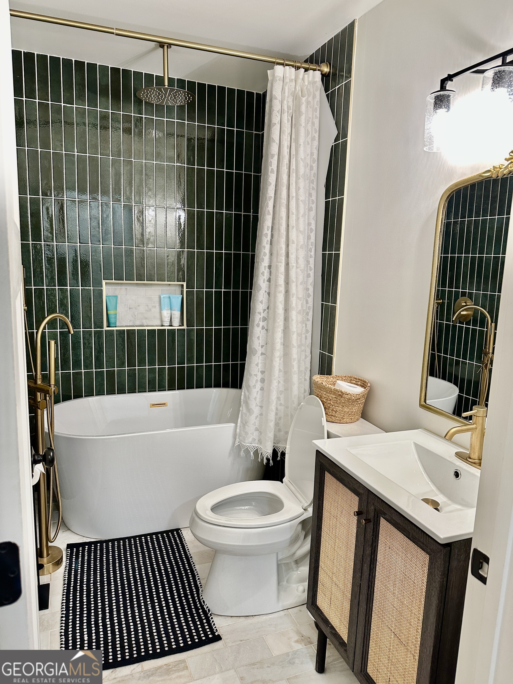 775 Ridgewood Avenue Gainesville, GA 30501 - Photo 38 of 77 a bathroom with a sink toilet and shower