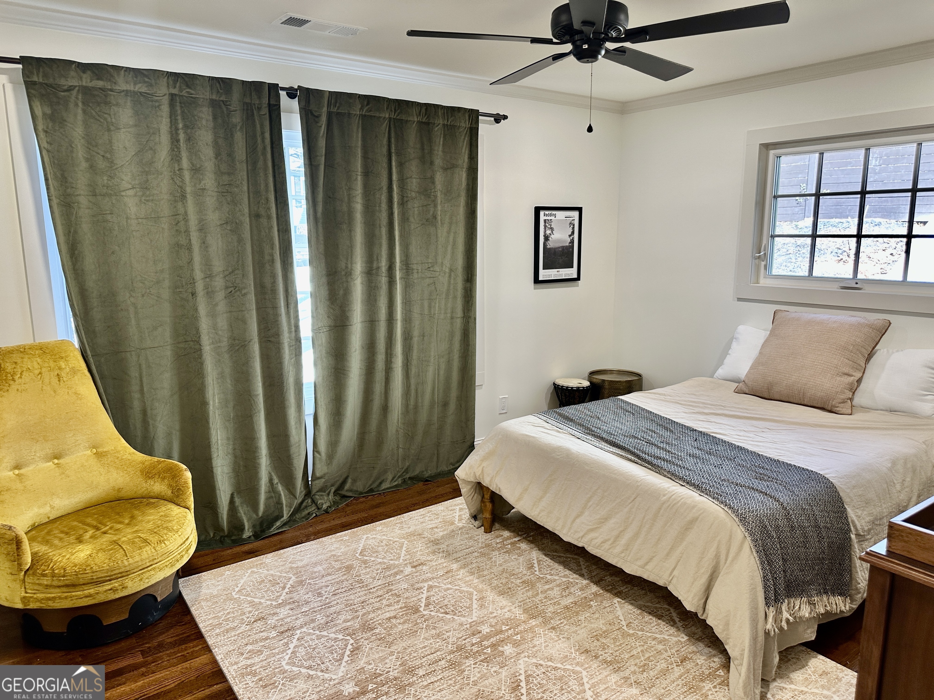 775 Ridgewood Avenue Gainesville, GA 30501 - Photo 40 of 77 a bedroom with a bed and a window