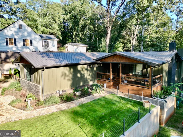 a view of a patio in backyard