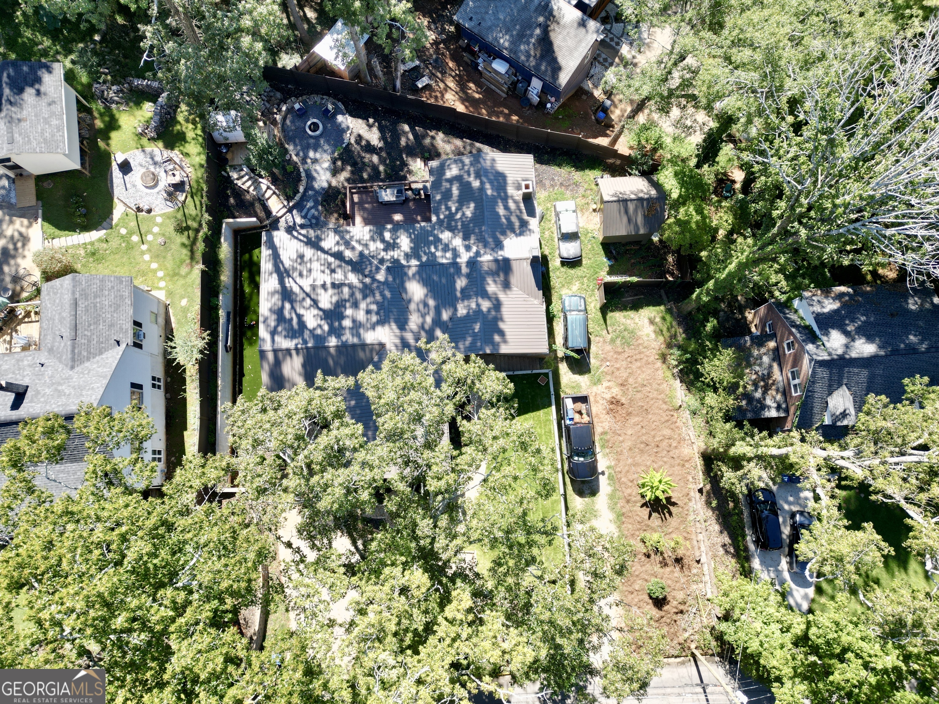 775 Ridgewood Avenue Gainesville, GA 30501 - Photo 68 of 77 a backyard of a house with lots of green space