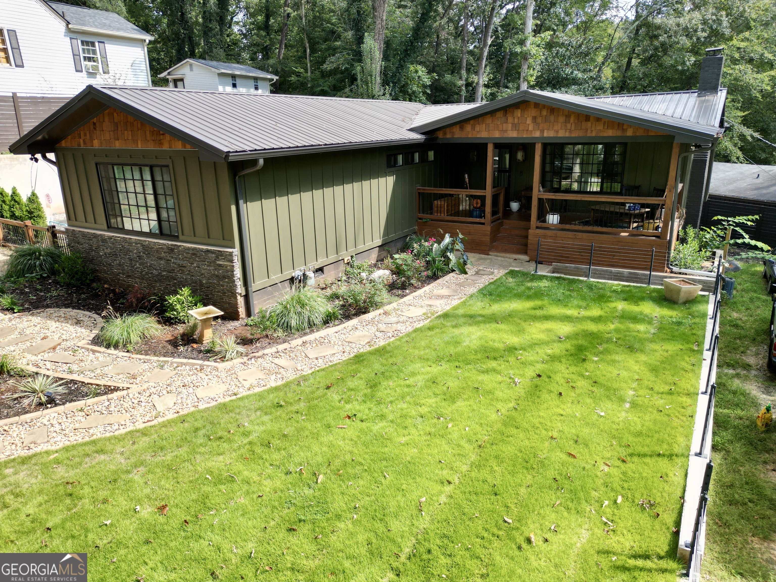 775 Ridgewood Avenue Gainesville, GA 30501 - Photo 77 of 77 a front view of a house with garden