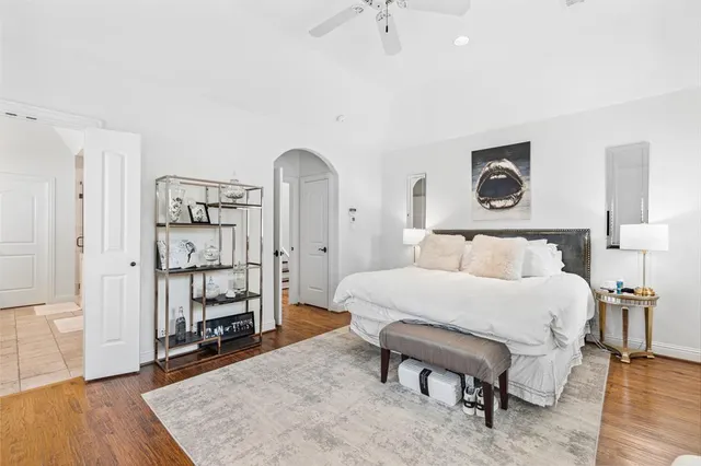 a bed room with a bed and a table