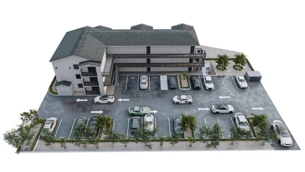 an aerial view of houses with outdoor space