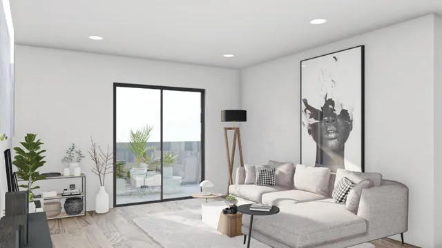 a living room with furniture and a floor to ceiling window