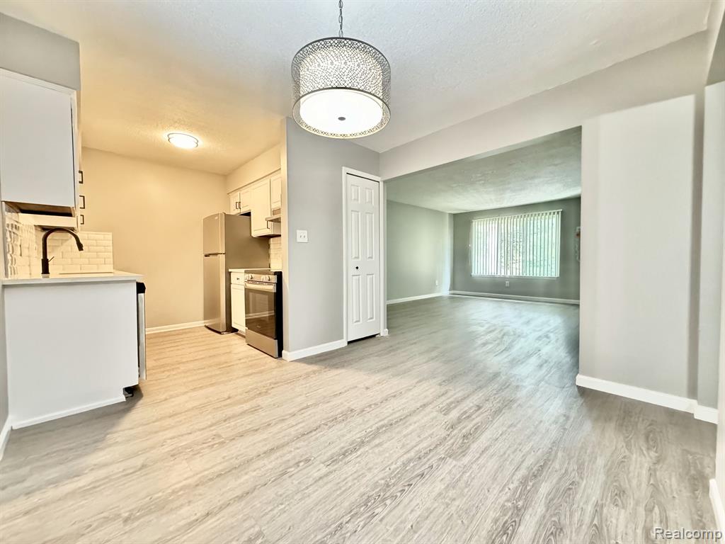 1250 East West Maple Road, Unit 8 Walled Lake, MI 48390 - Photo 5 of 12