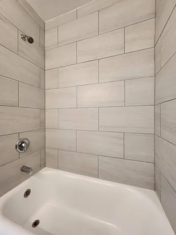 a bathroom with a bathtub