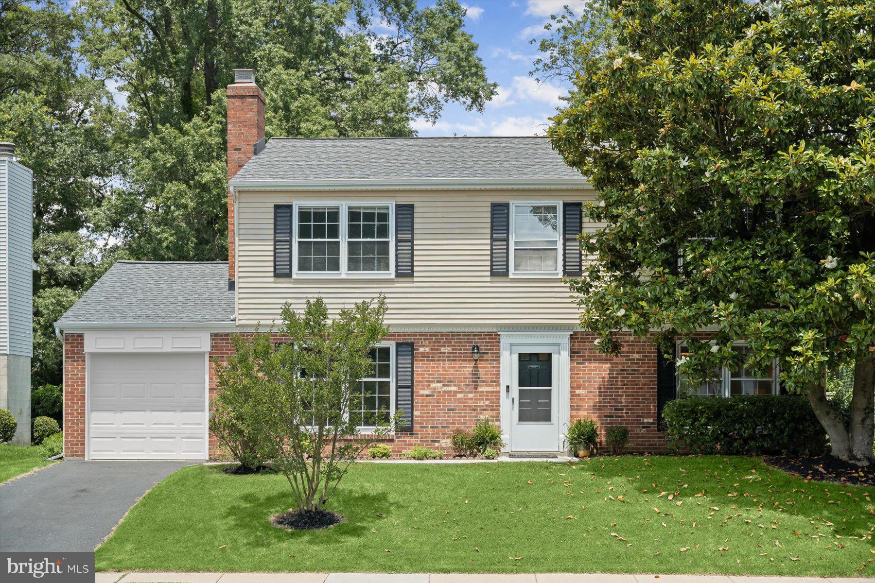 6819 Ben Franklin Road Springfield, VA 22150 - Photo 1 of 47 front view of a house and a yard