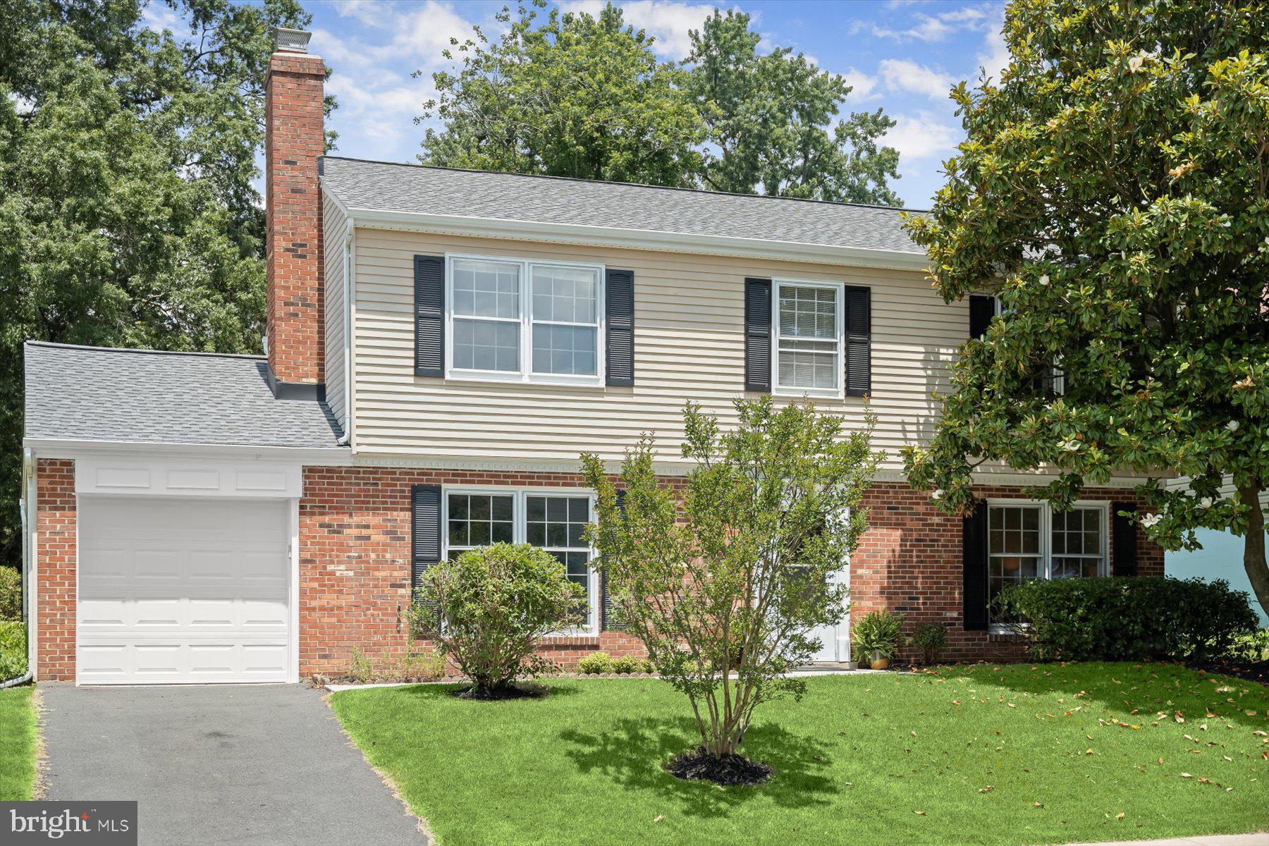 6819 Ben Franklin Road Springfield, VA 22150 - Photo 2 of 47 front view of a house with a yard