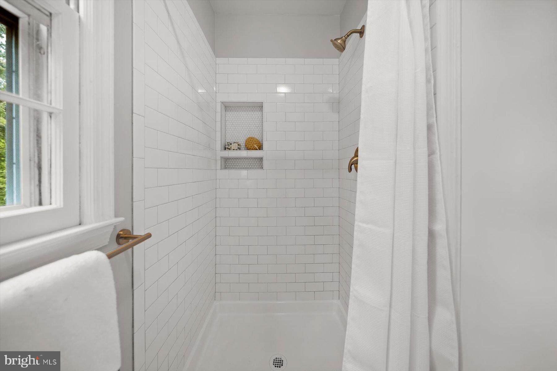 6819 Ben Franklin Road Springfield, VA 22150 - Photo 28 of 47 a bathroom with a shower