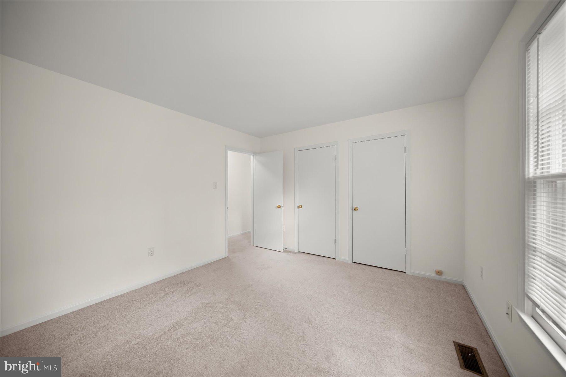 6819 Ben Franklin Road Springfield, VA 22150 - Photo 33 of 47 a view of an empty room and a window