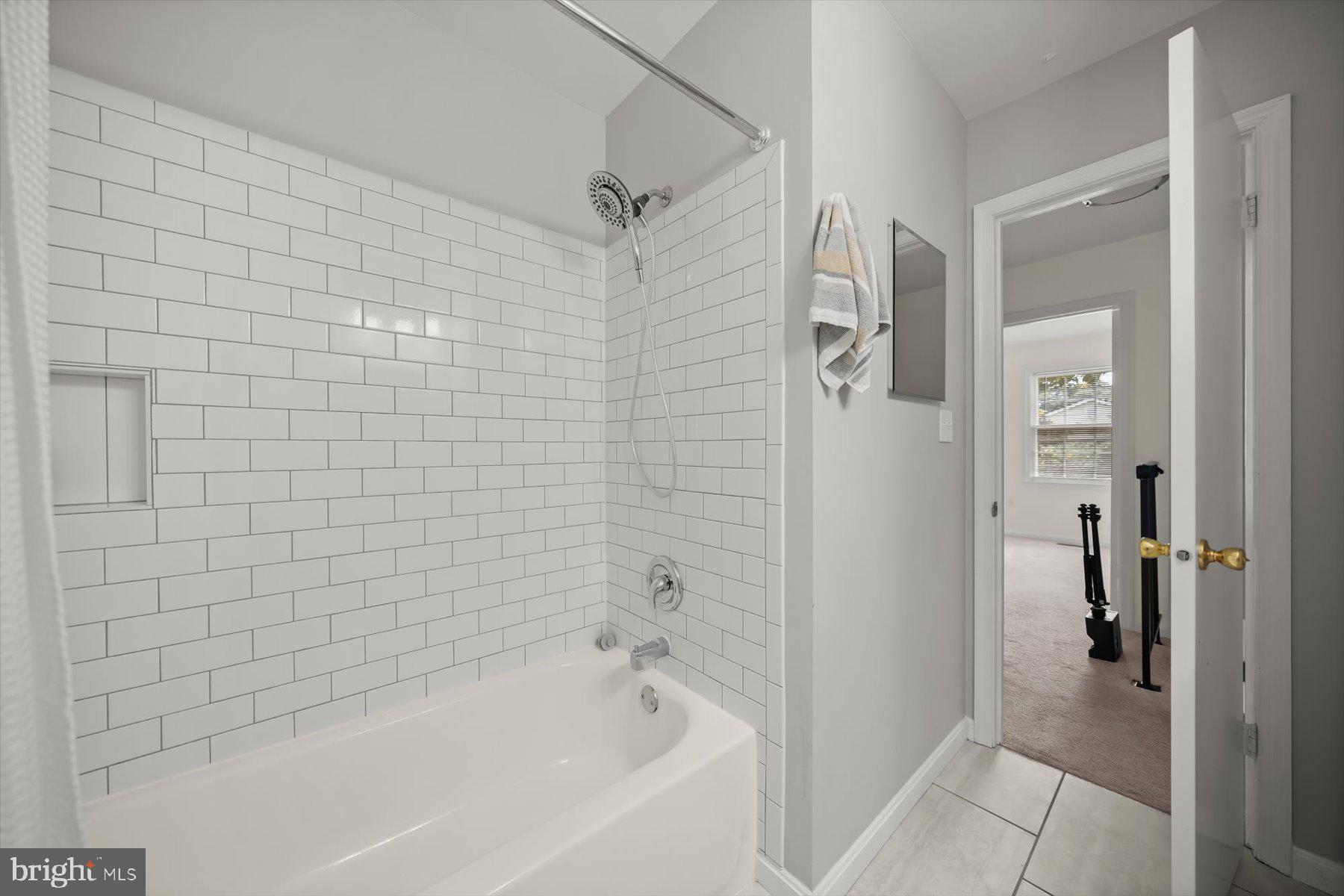 6819 Ben Franklin Road Springfield, VA 22150 - Photo 35 of 47 a bathroom with a bathtub