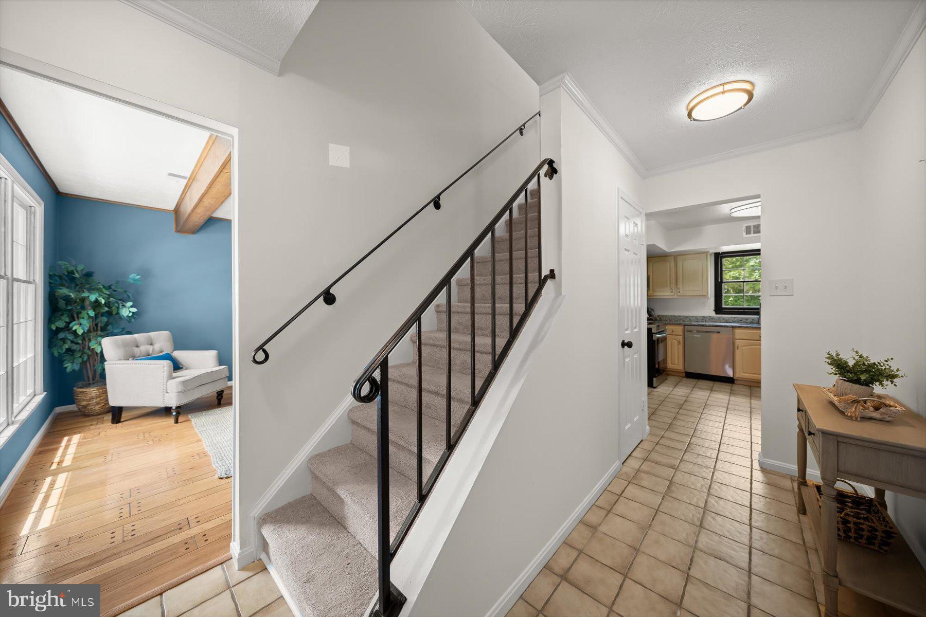 6819 Ben Franklin Road Springfield, VA 22150 - Photo 6 of 47 a view of entryway and hall with wooden floor