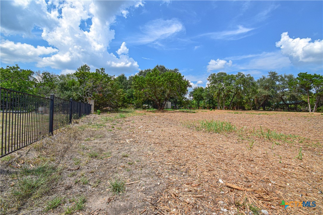 332 Arrowhead Point Road Belton, TX 76513 - Photo 3 of 15 a backyard of a house with lots of green space