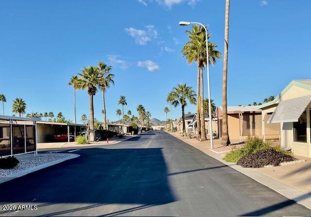 9302 East Broadway Road, Unit 76 Mesa, AZ 85208 - Photo 11 of 38 a view of a house with a patio