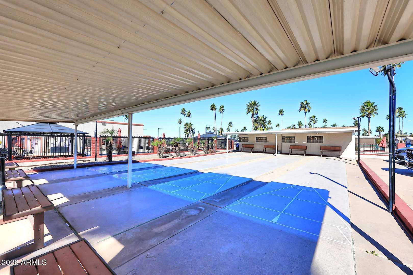 9302 East Broadway Road, Unit 76 Mesa, AZ 85208 - Photo 17 of 38 a view of a swimming pool with a patio