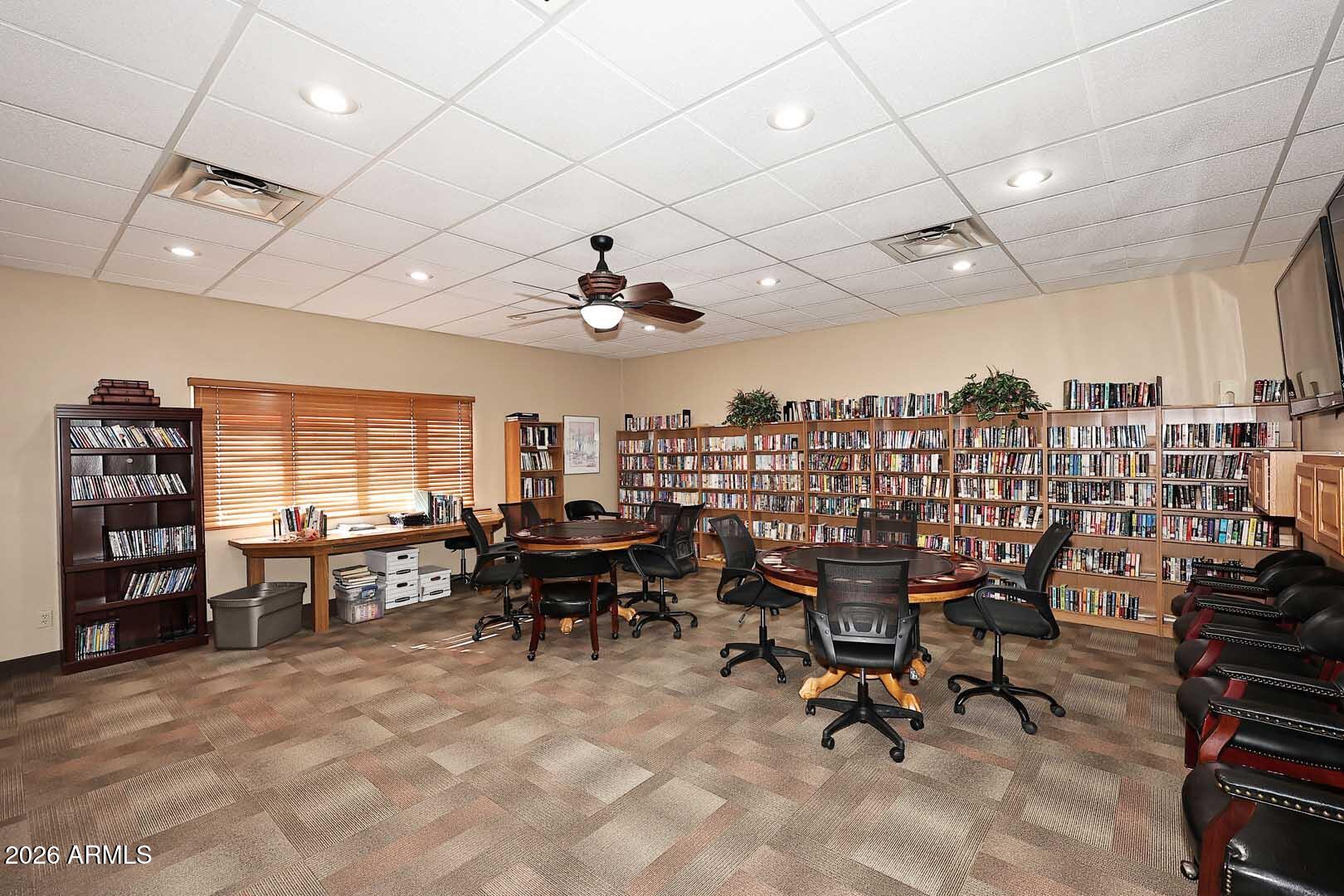 9302 East Broadway Road, Unit 76 Mesa, AZ 85208 - Photo 19 of 38 a view of a dining room with furniture window and outside view