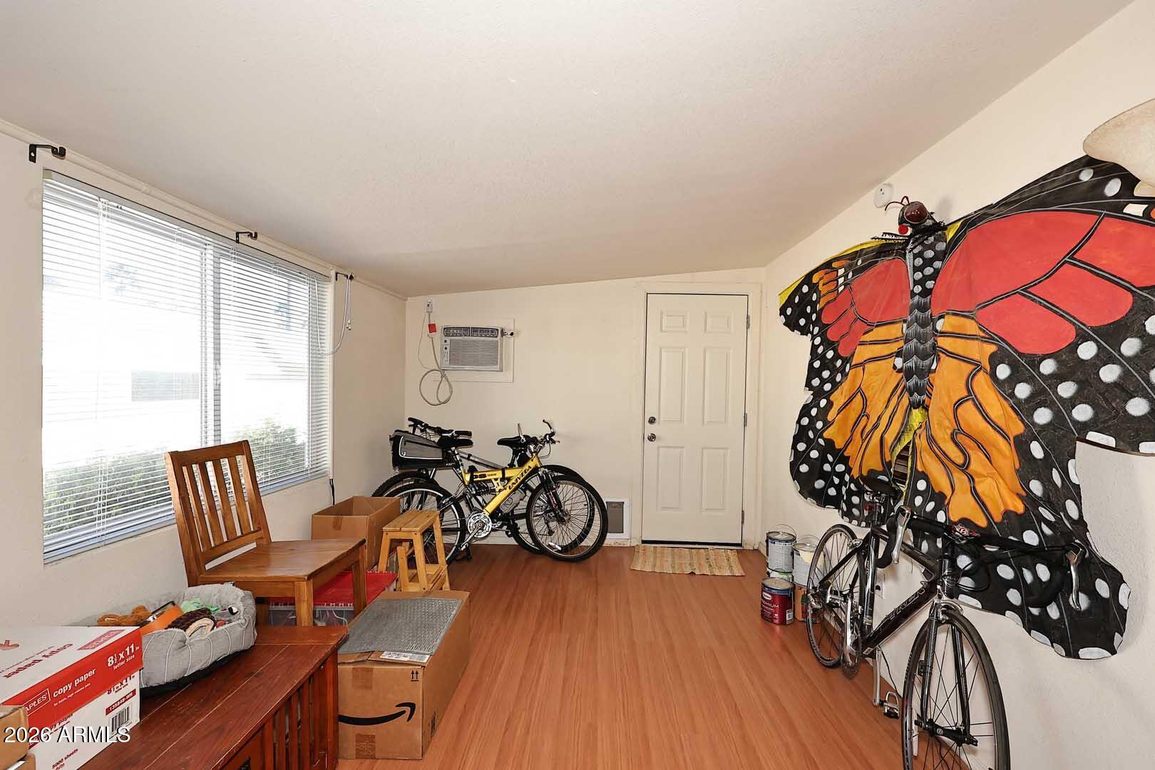 9302 East Broadway Road, Unit 76 Mesa, AZ 85208 - Photo 30 of 38 a view of a room with gym equipment