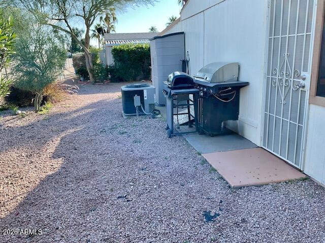 9302 East Broadway Road, Unit 76 Mesa, AZ 85208 - Photo 10 of 38 a view of a house with backyard and sitting area