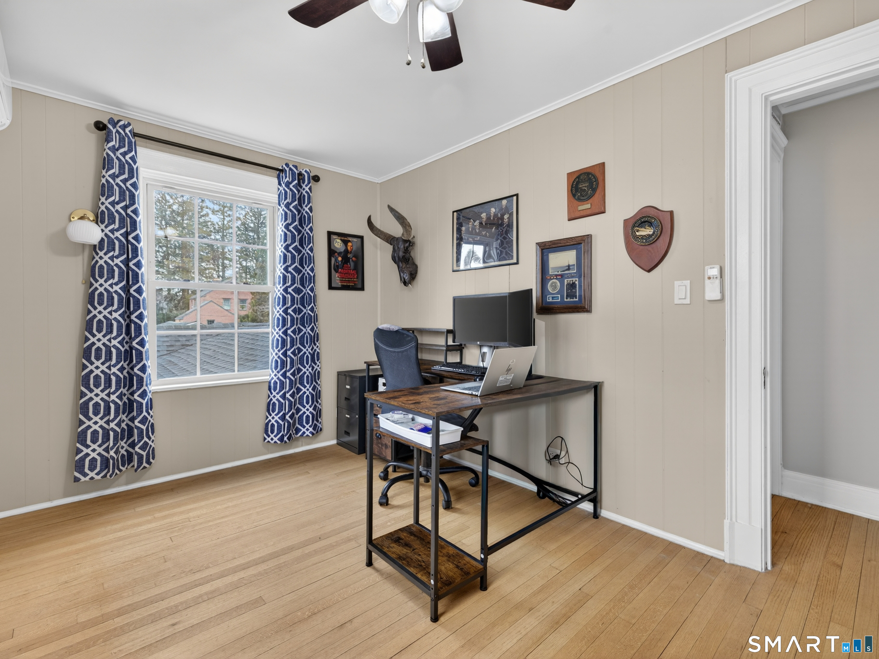 76 Starr Hill Road Groton, CT 06340 - Photo 28 of 40 a view of a workspace with furniture and a window