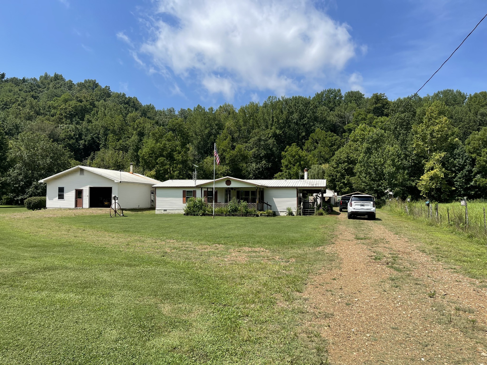 2330 Dog Branch Road Prospect, TN 38477 - Photo 1 of 31 a front view of a house with a yard