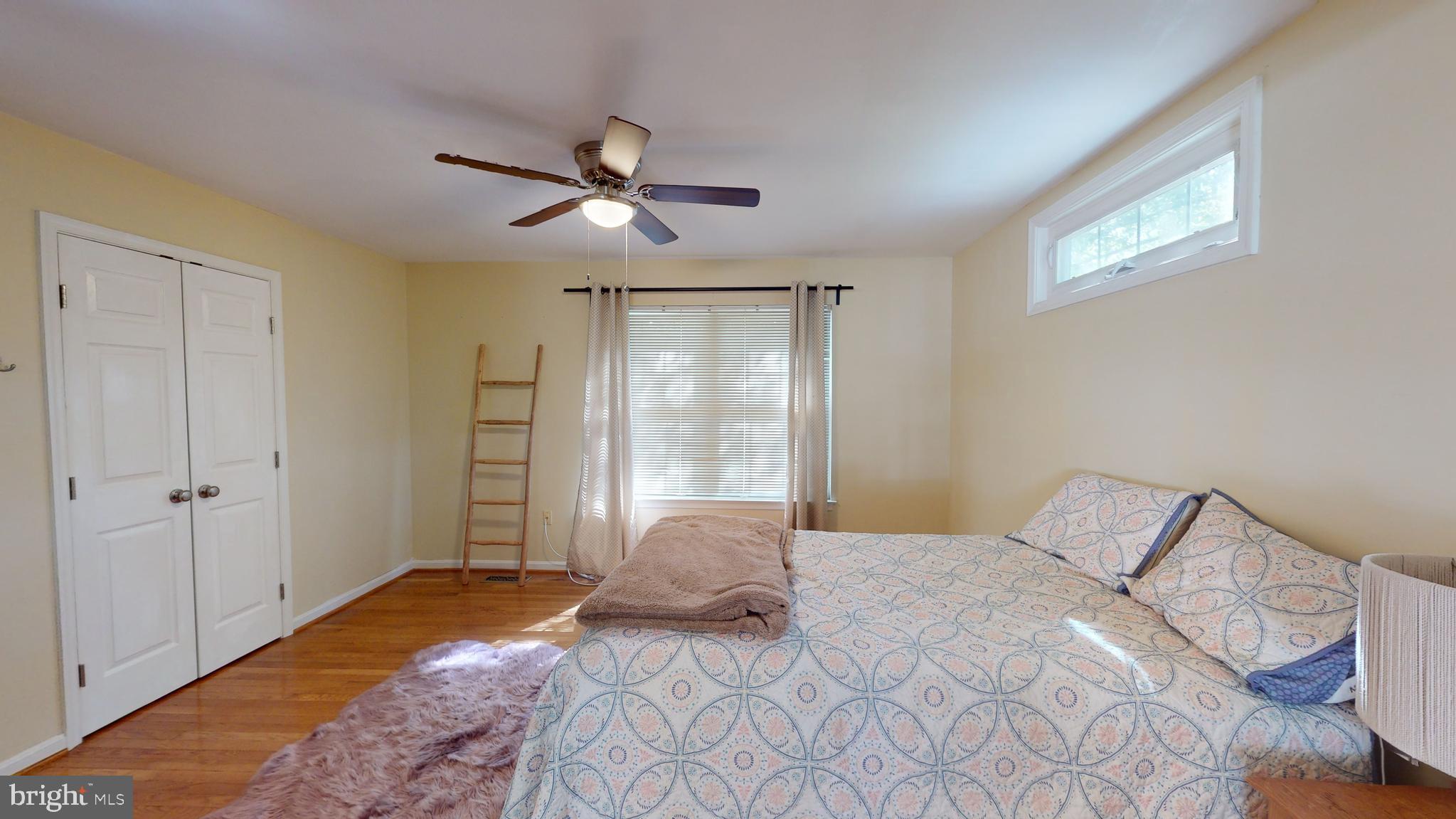 10600 Ward Road Dunkirk, MD 20754 - Photo 50 of 144 a bedroom with a large bed and a window