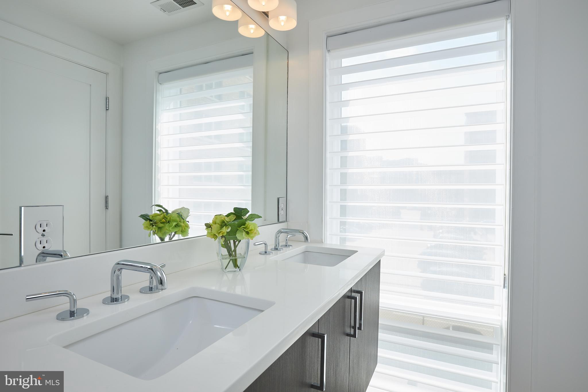 2014 Kalorama Road Northwest, Unit 8 Washington, DC 20009 - Photo 18 of 43 Primary Bath with Dual Sinks Natural Light