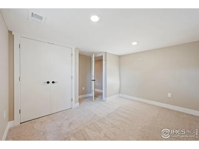 a view of a hallway with washer and dryer