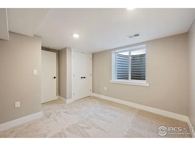 a view of yard with swimming pool and green space