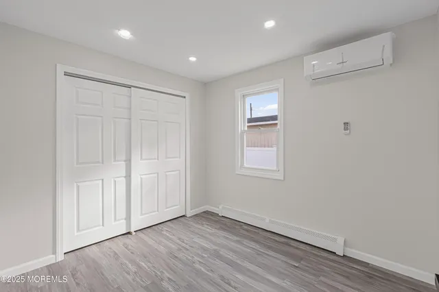 a kitchen with granite countertop a stove and a refrigerator