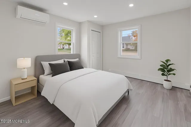 a kitchen with stainless steel appliances granite countertop a sink stove and wooden cabinets