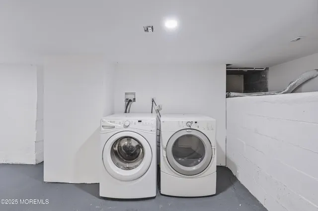 a picture of a room with a white wall and white cabinet