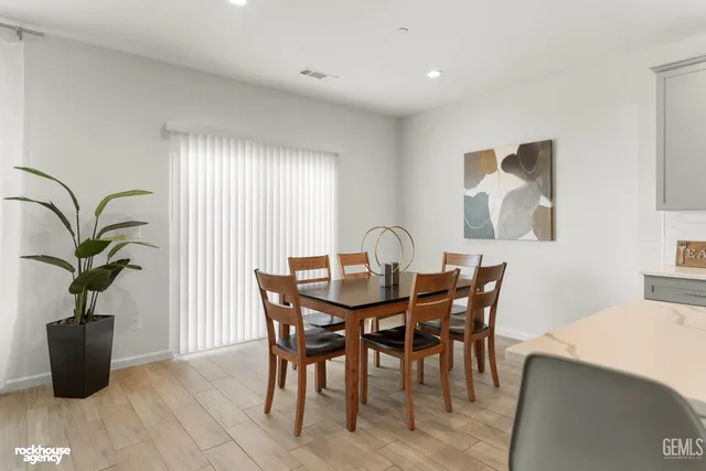 a kitchen with stainless steel appliances granite countertop a stove and a microwave