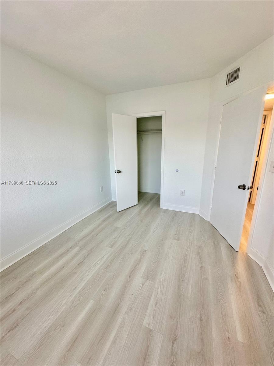 434 Northwest 85th Street Road, Unit 434 Miami, FL 33150 - Photo 25 of 31 a view of an empty room