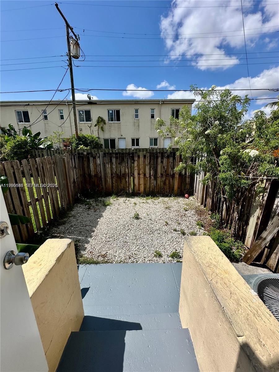 434 Northwest 85th Street Road, Unit 434 Miami, FL 33150 - Photo 9 of 31 a view of a patio