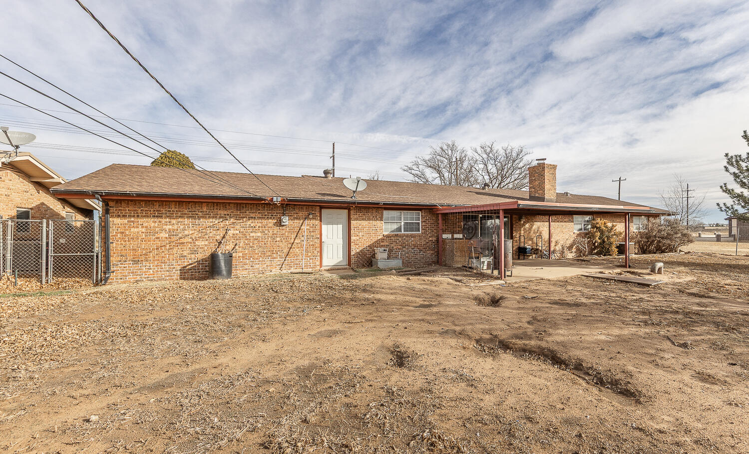 505 Owen Street Lubbock, TX 79403 - Photo 24 of 32 a big house with large windows and more windows