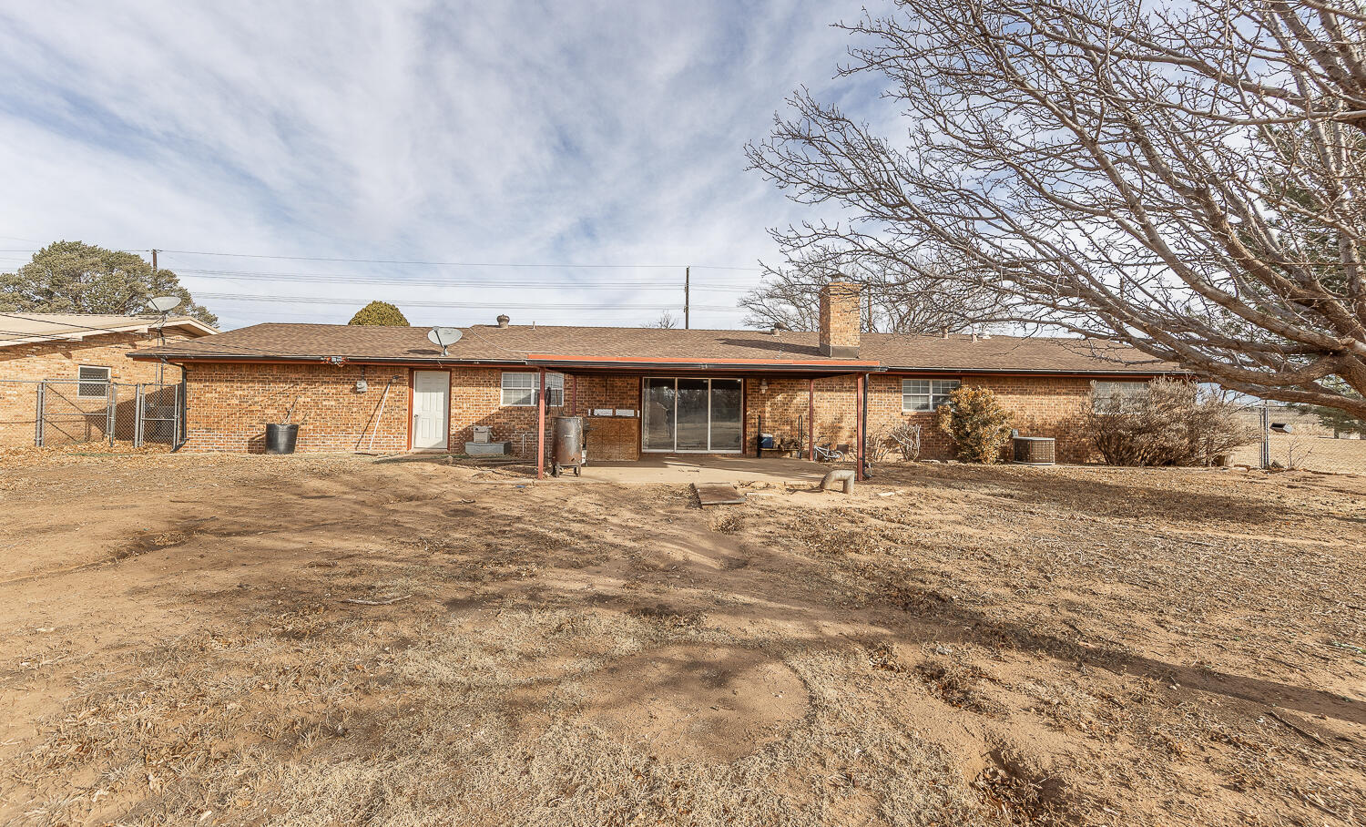 505 Owen Street Lubbock, TX 79403 - Photo 25 of 32 a front view of a house with a yard