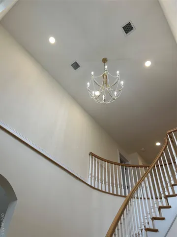 a view of a livingroom with stairs