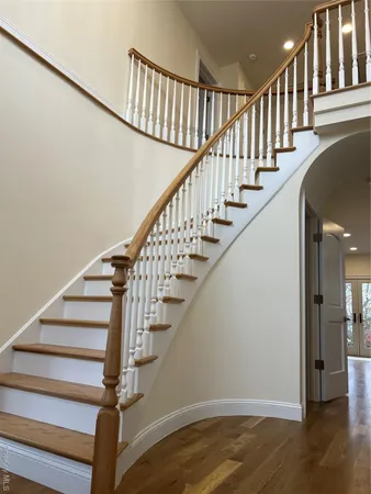 a view of entryway with wooden floor