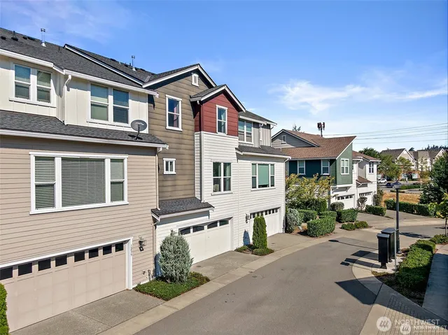 a view of a house with a parking area