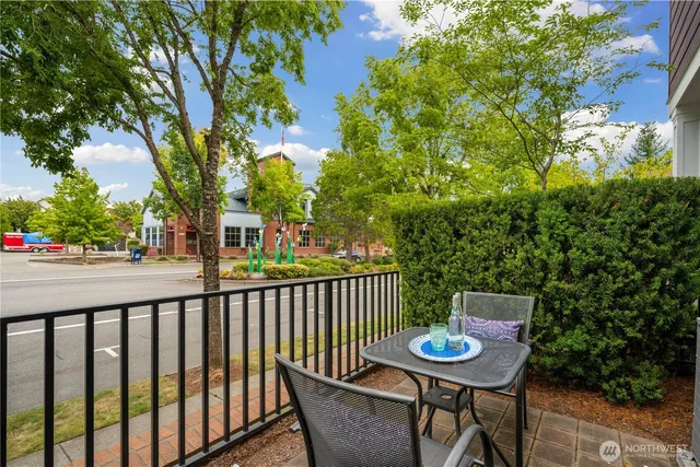 a view of a table and chairs in the patio