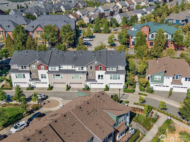 a picture of a bathroom with a window and a picture