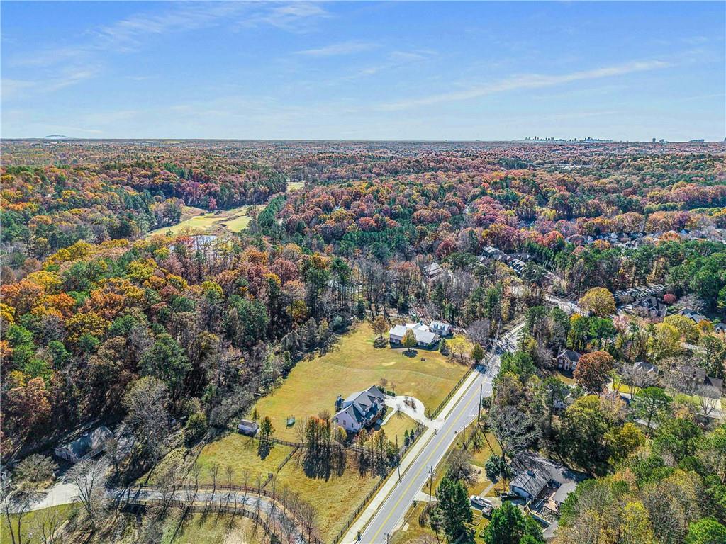 9245 Brumbelow Road Alpharetta, GA 30022 - Photo 46 of 50 an aerial view of a city