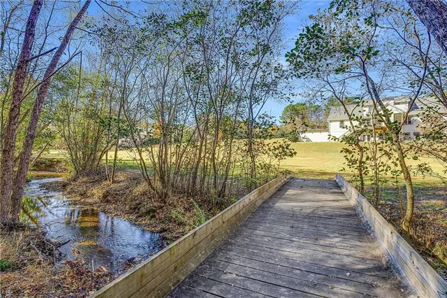 a view of swimming pool with a patio