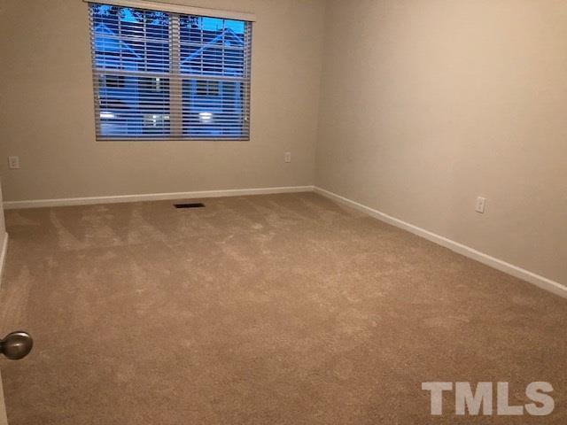 6033 Beale Loop Raleigh, NC 27616 - Photo 7 of 16 a view of an empty room