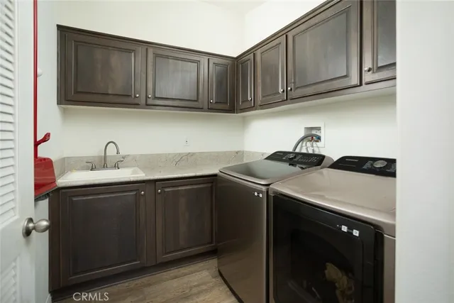 a garden view with a seating space and fir pit