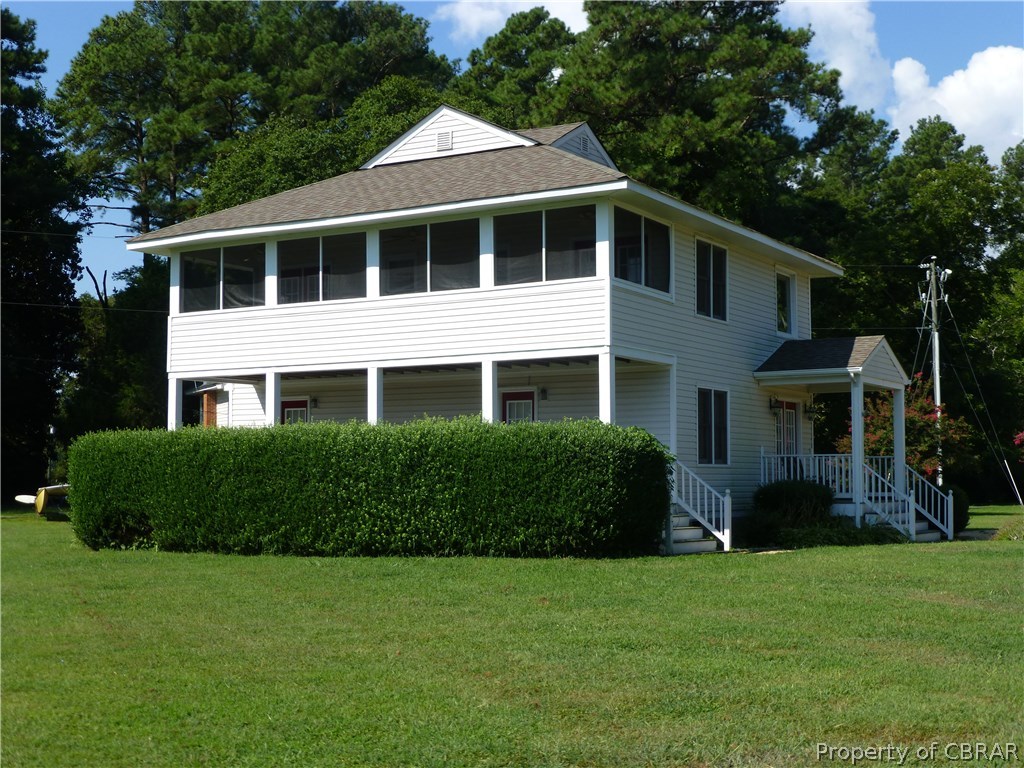 464 Jackson Creek Road Deltaville, VA 23043 - Photo 2 of 26 Screen porch with views to Jackson Creek and Chesapeake Bay runs the whole width of house - 30 feet wide!