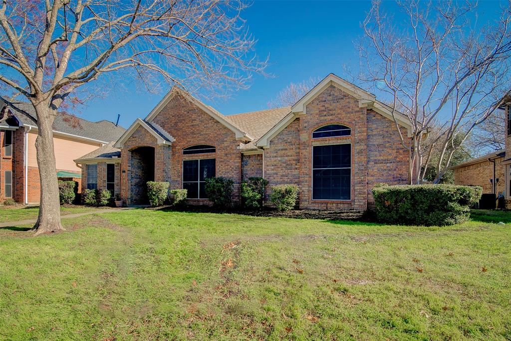 815 Fairlawn Street Allen, TX 75002 - Photo 1 of 22 a front view of a house with garden